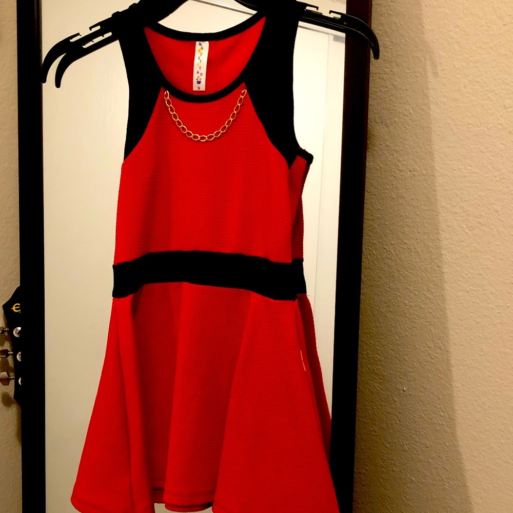 Red and dar blue black dress with little necklace in the front